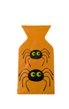 Orange bag with spider designs on a white background